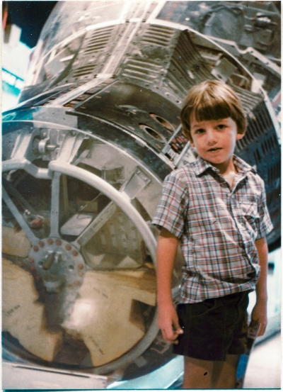 Kai at the Air Force Space and Missile Museum, Cape Canaveral Air Force Station, Florida, standing in front of the Gemini 2 capsule. This is Flight Hardware, and was sent into space on two different occasions, being the first American crew-capable spacecraft to do so. Photograph by James MacLaren.
